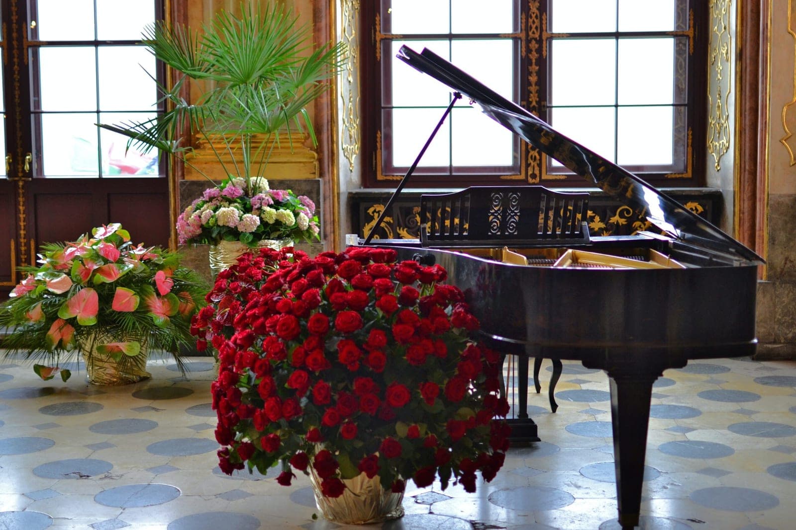 A grand piano in an elegant room