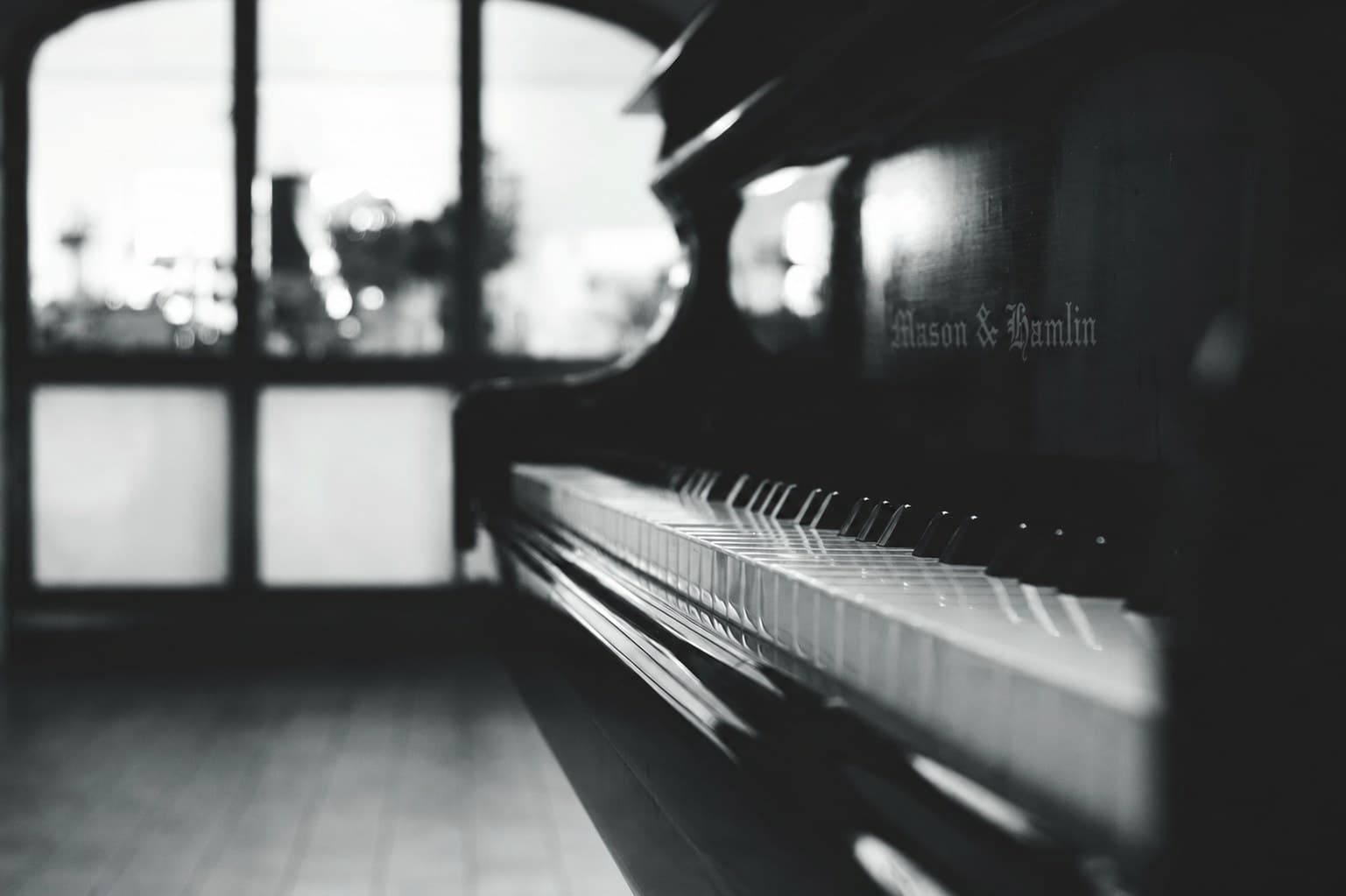 Close-up of grand piano keys